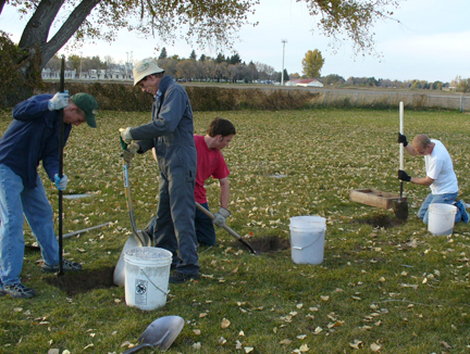 Eagle Scouts worked with SHS's landscape crew to place more than 200 of the headstones in the cemetery.