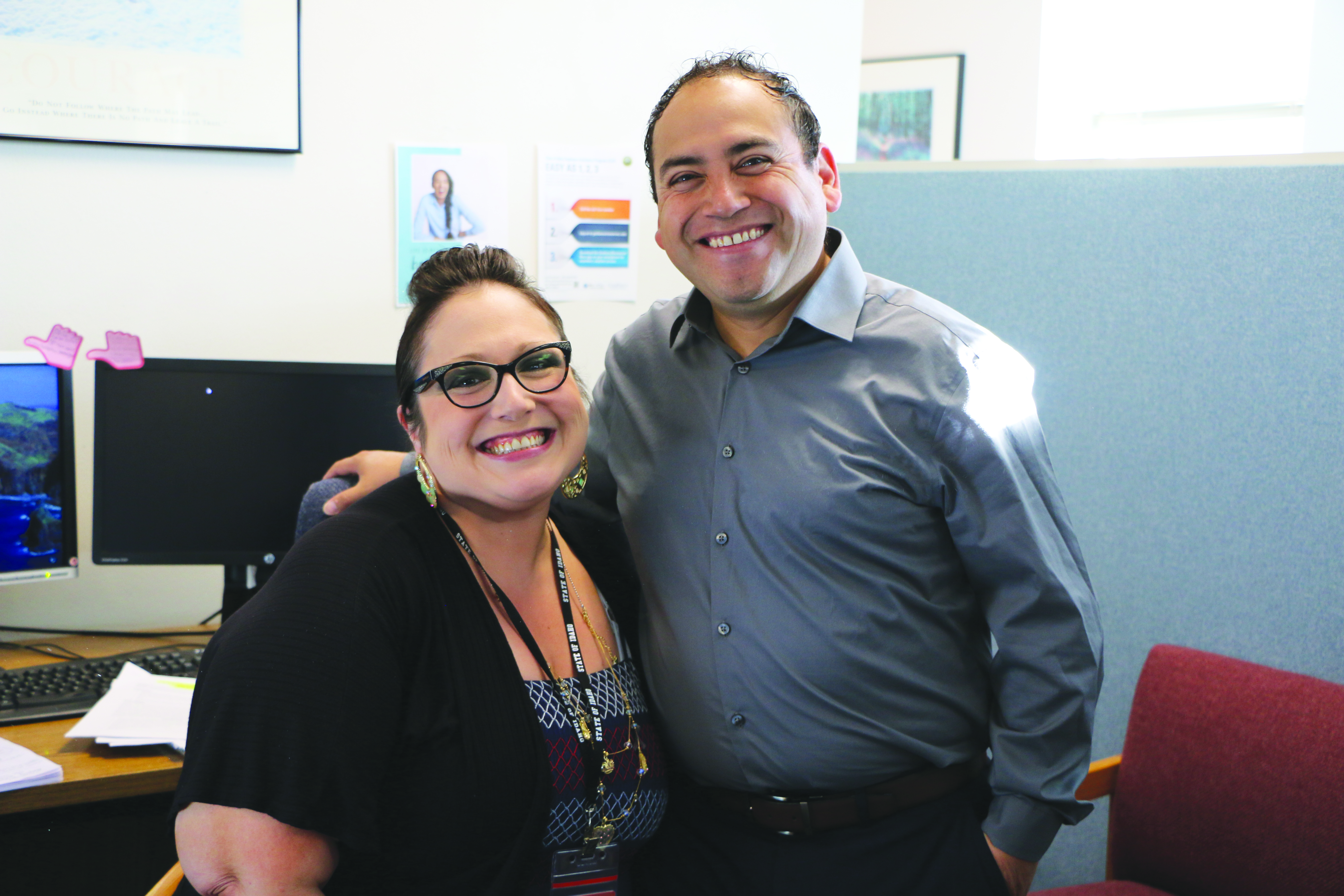 Carlos Ramos, pyschosocial rehabilitation specialist, and Christine Poff, client services technician, pause for a photo before starting their work day in Family and Community Services. See page 3 to read about a day in the life of Carlos.